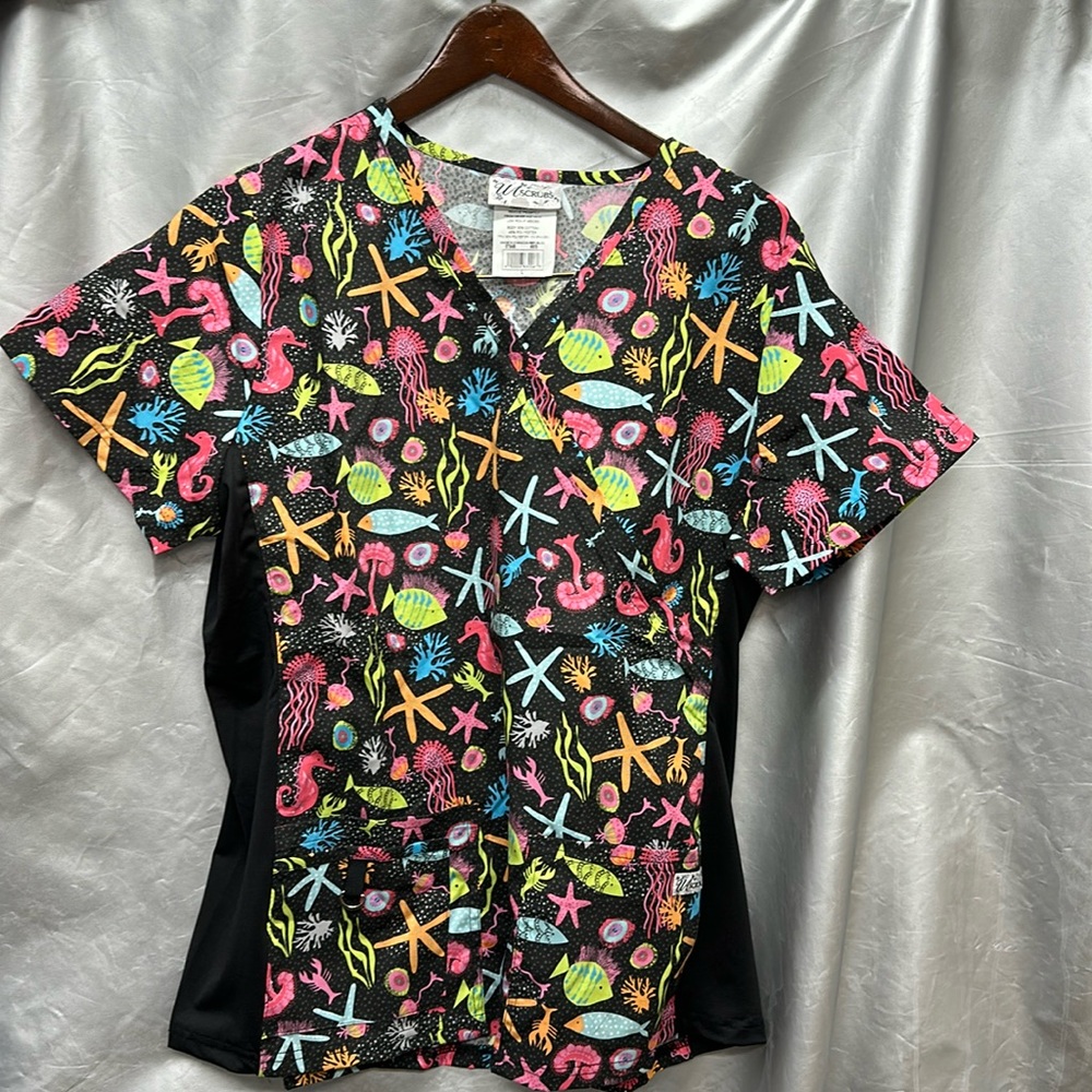 UA uniforms size large, multi colored ocean theme